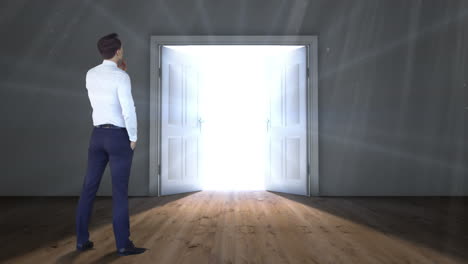 door opening to light watched by businessman