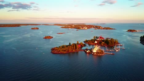 aerial panning shot of the small islands in the gulf of finland off the coast of helsinki, finland