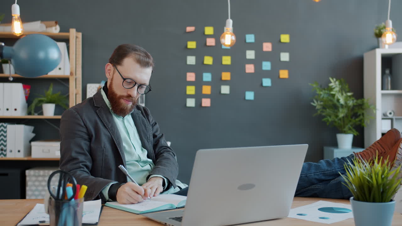 Businessman working on a laptop in the office
