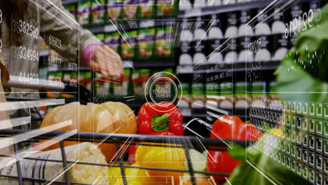 animation of processing data over caucasian woman with vegetables in shopping cart