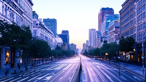 a view of a busy city street at night