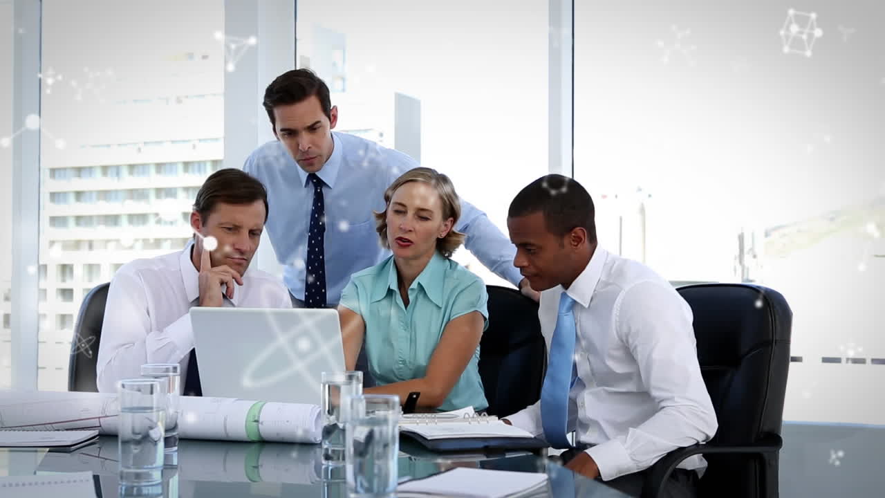 Animation of molecules over business people in meeting