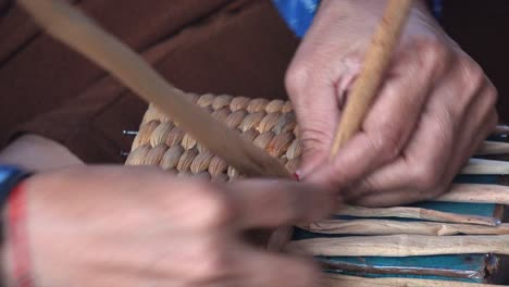 Close-Interior-Shot-of-Craftsperson-Weaving