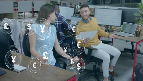 animation of currency icons and data processing over diverse business people in office