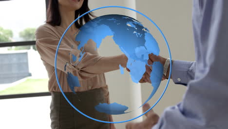 animation of globe over businessman handshake