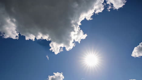 beautiful blue sky with clouds and sun