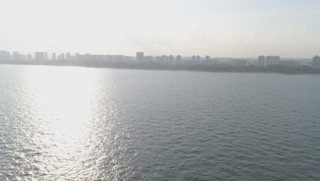 coastal cityscape with buildings and water