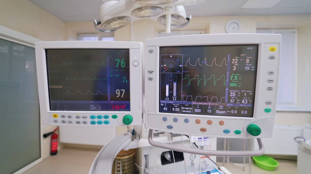 Special monitors showing heart rate and pulse. Electrocardiogram on a display. Graphics of electrical activity of patient's heart beat on two modern monitors.