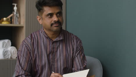 man indoors portrait
