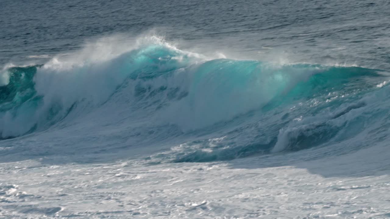 Powerful Atlantic waves crash against the rugged volcanic coastline near Timanfaya National Park in Lanzarote, part of Spain’s Canary Islands.