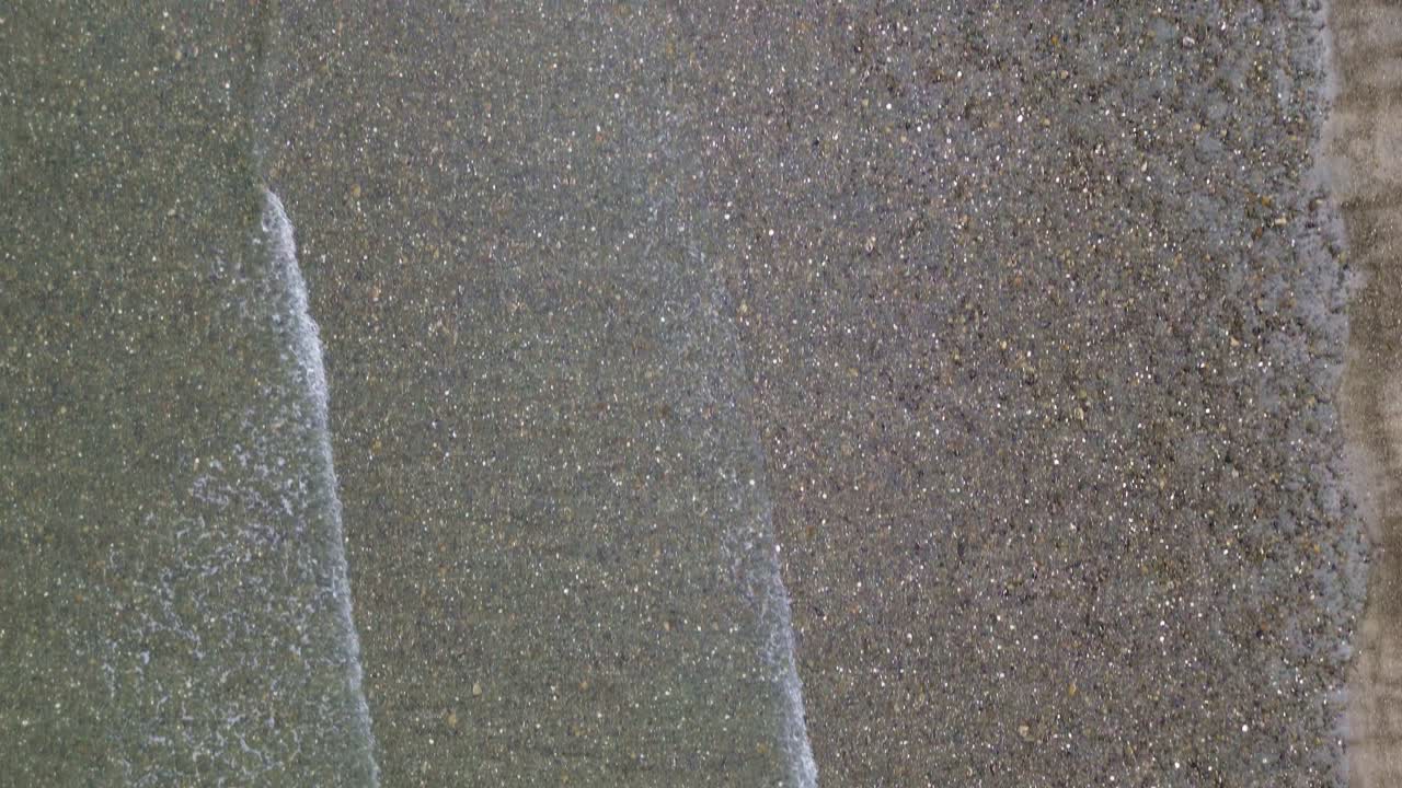 Top Down View Over Ocean Waves Along Grey Bay Beach, BC, Canada