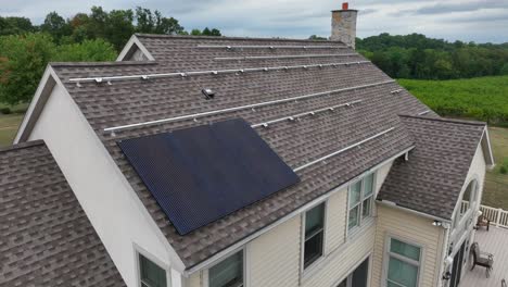 rooftop solar panel array partially installed