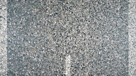 close up of asphalt with white line