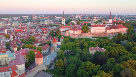 aerial shot of tallinn, estonia during the summer months at sunset. breathtaking skyline views of the entire city.