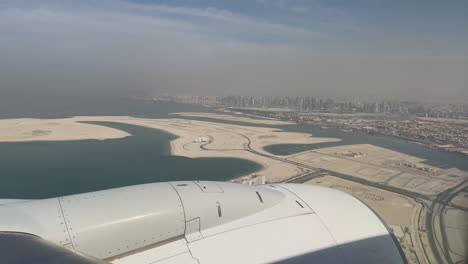 aerial view of urban development and man-made islands in dubai