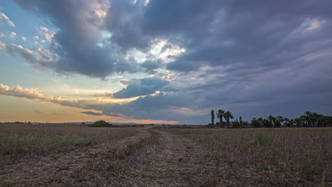 fast moving clouds across the field, wide angle timelapse