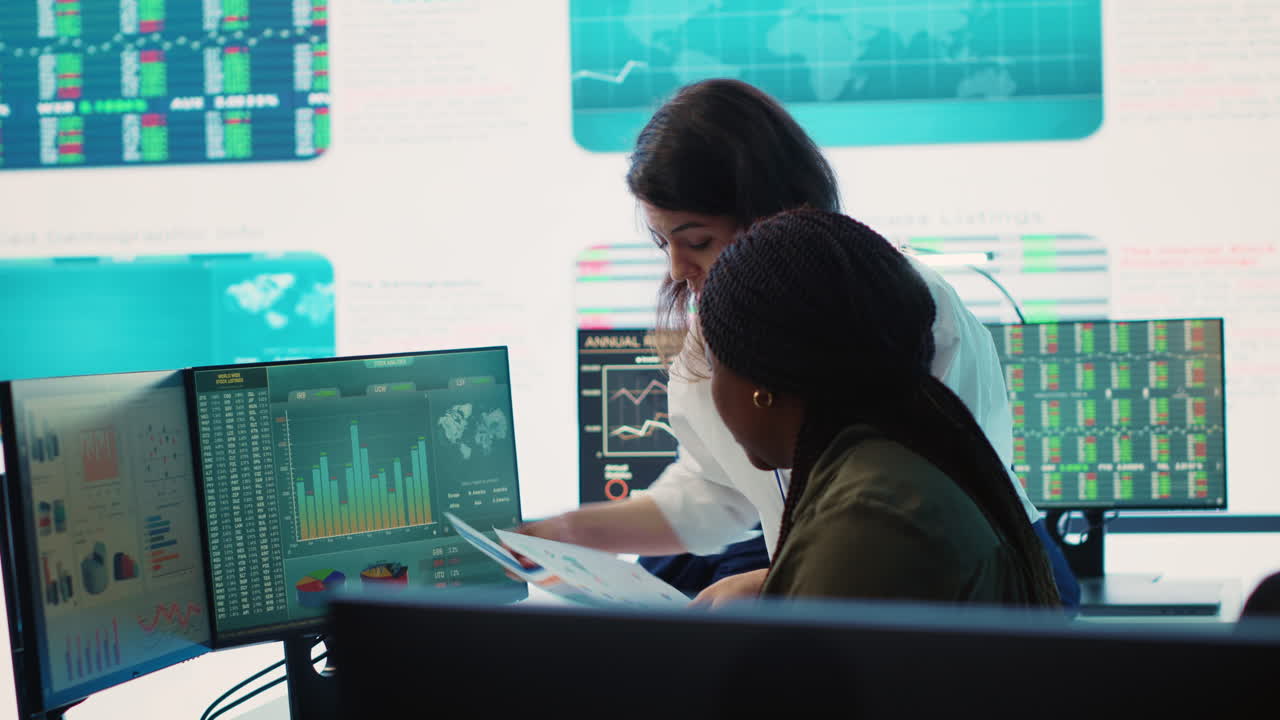Company employees exchanging project details and big data