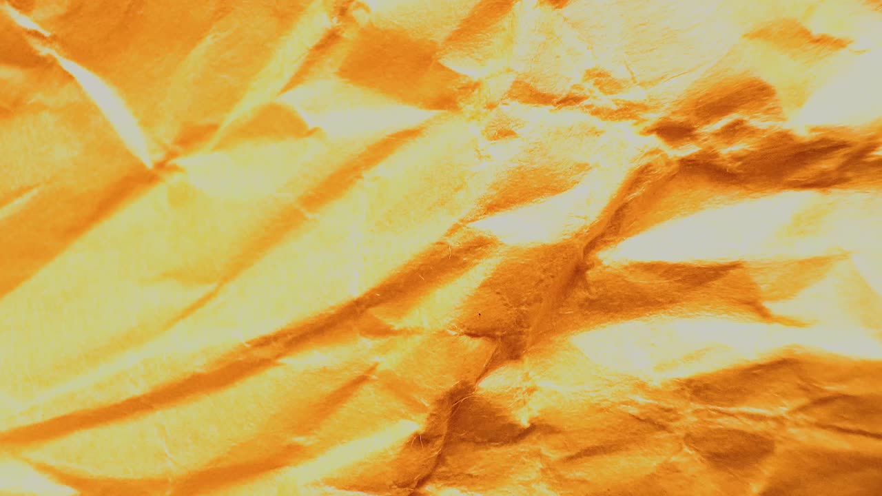 Crumpled Gold Paper Texture Background