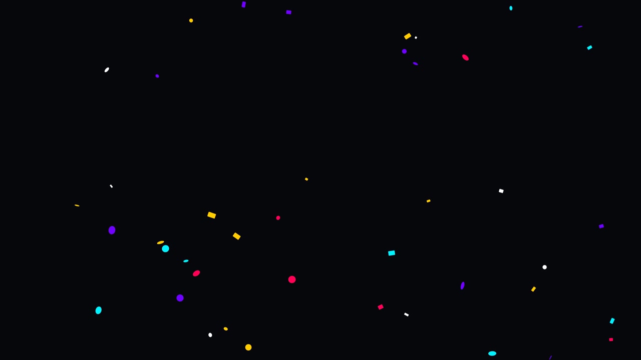 Coriandoli colorati che cadono su uno sfondo nero.