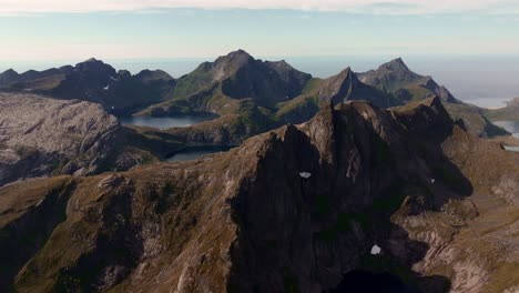 Aerial-view-of-Segla-mountain-above-the-sky,-Norway-during-summer