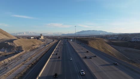 capturing traffic over freeway interstate 15 in draper utah - aerial shot