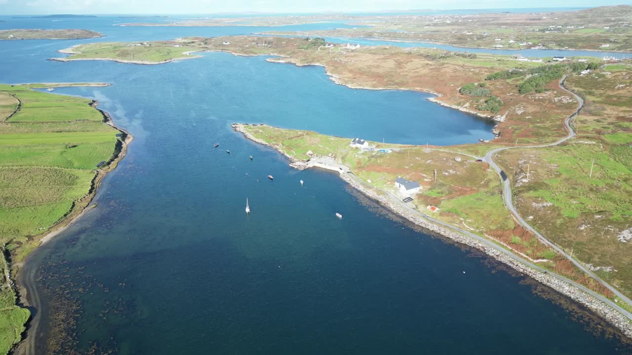 Aerial reveal over Connemara’s rolling countryside, coastline and winding roads in Galway, Ireland—showcasing the wild beauty of the Atlantic-edge rural landscape