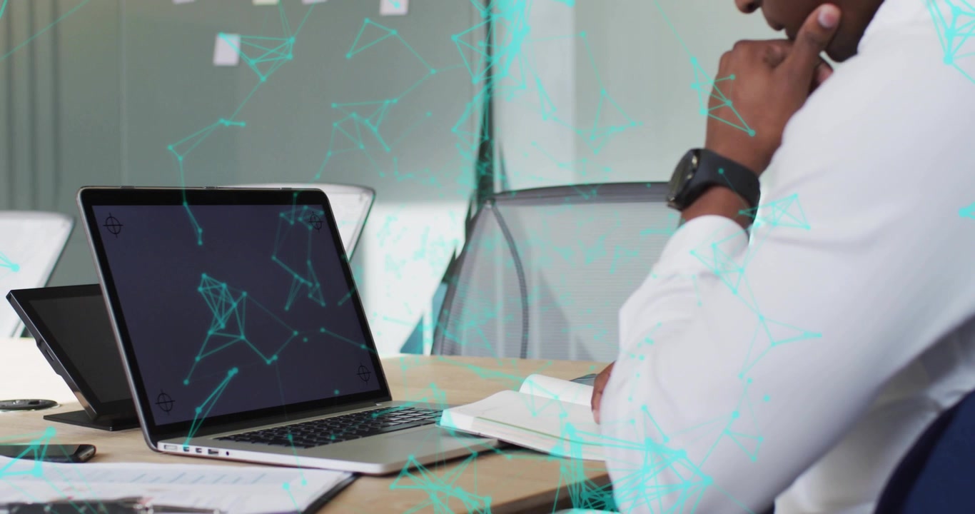 Data analyst opening laptop, scanning network data while live graphs highlighting analysis focus