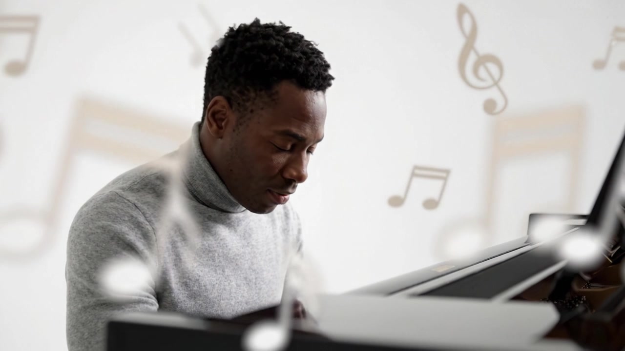 A talented musician passionately plays the piano, capturing expressive emotions through his performance in a minimalist setting full of musical notes.
