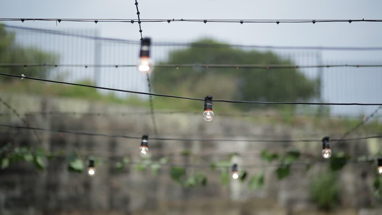 Outdoor string light decoration, low angle static shot