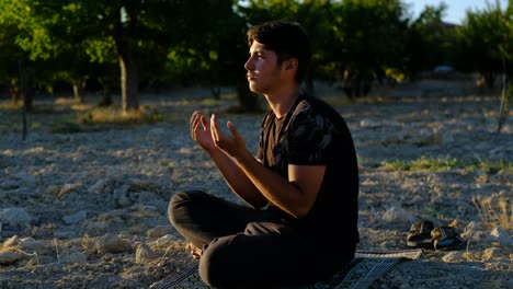 muslim praying nature ground