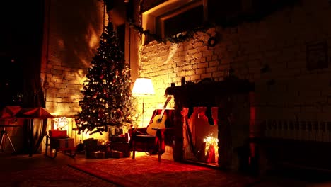 warm atmosphere of christmas interior in house with festive tree spruce and fake fireplace in loop