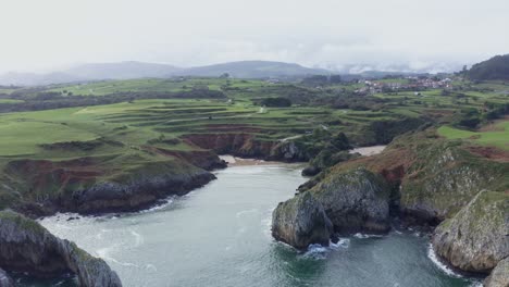 picturesque view of rocky cliff and sea against sky