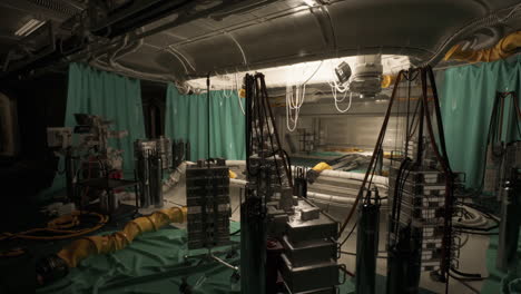 exploring scientific equipment in a concealed laboratory within a bunker