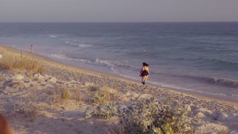 woman with prosthetic leg at the beach