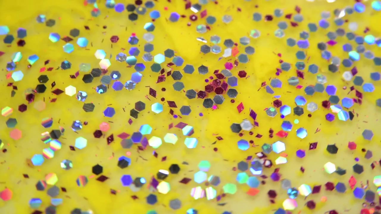 Yellow background with colorful glitter