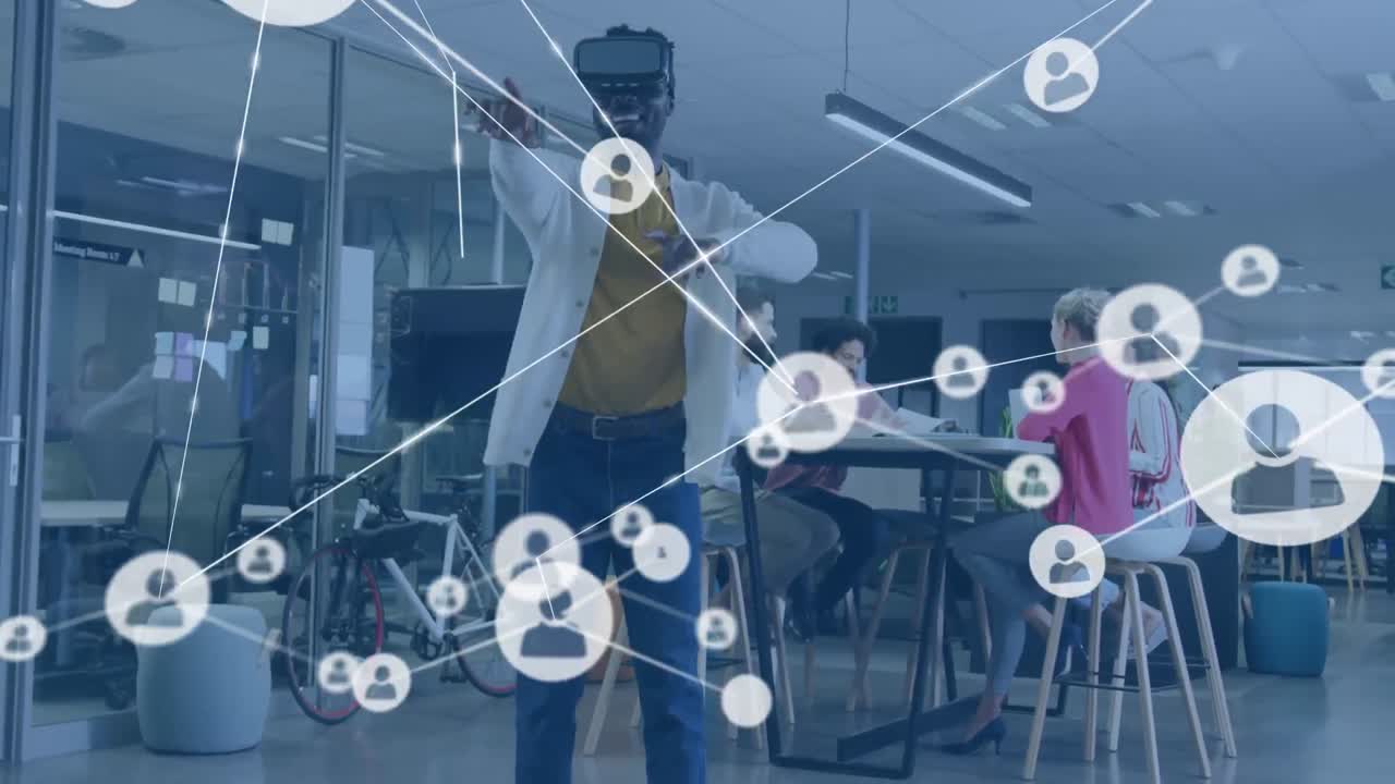 animación de la red de iconos de perfil contra el hombre afroamericano que usa auriculares vr en la oficina.