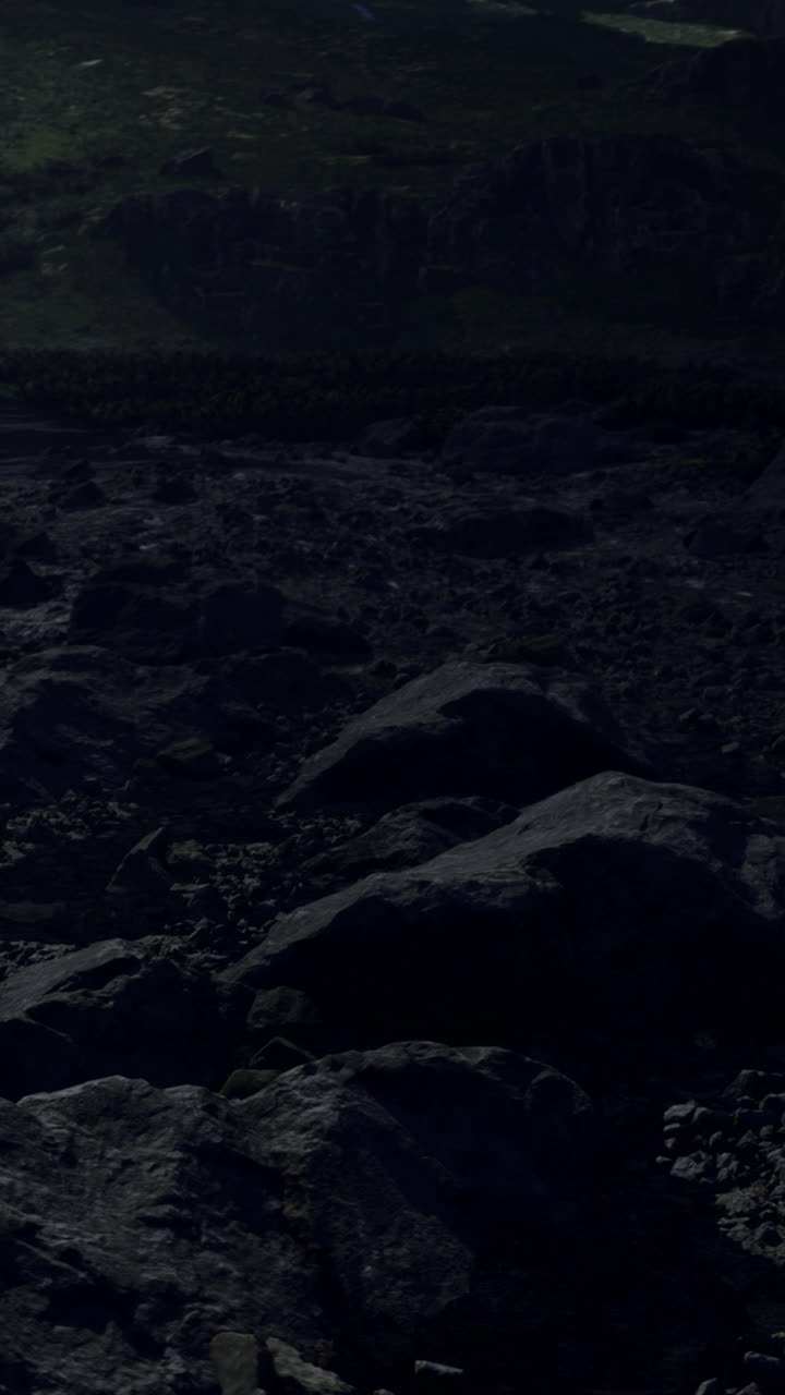 Rocky landscape under night sky in remote mountain location
