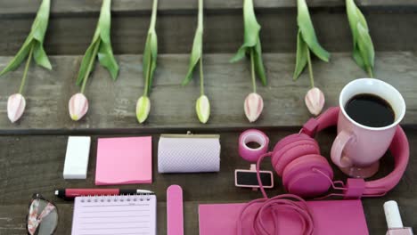 female accessories, stationery and coffee on table 4k