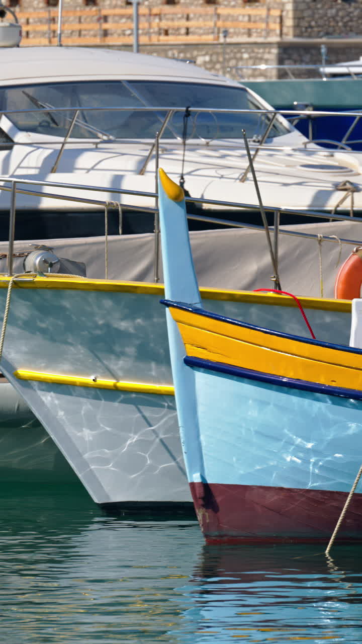 Close up of boats docked in the Port Vauban in Antibes, France. Vertical