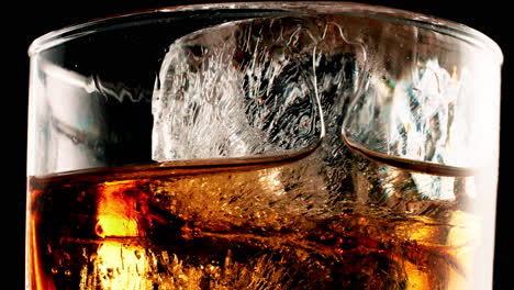 whiskey with ice in a glass