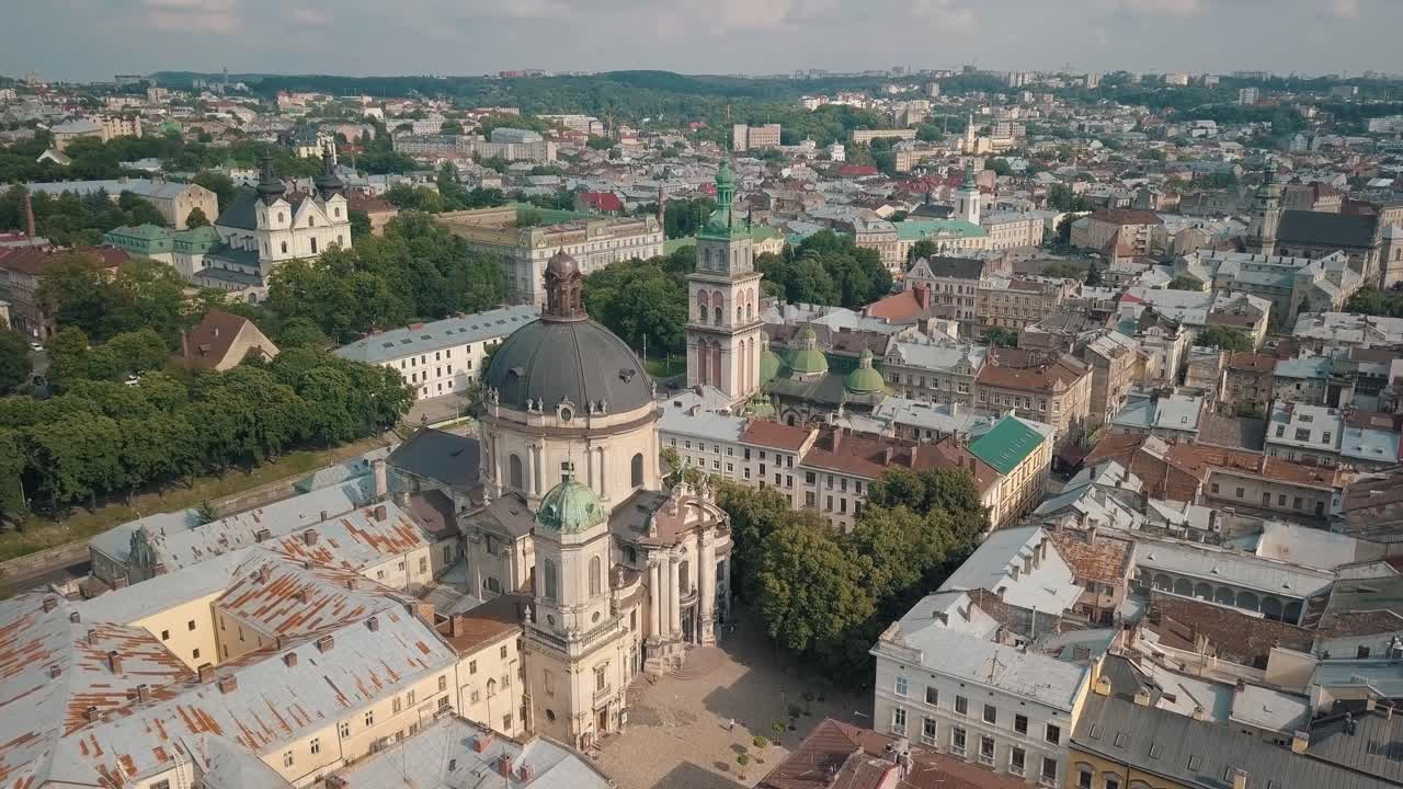 Aerial drone video of city Lviv, Ukraine. Ancient Ukraine Dominican Church. Panorama of old town