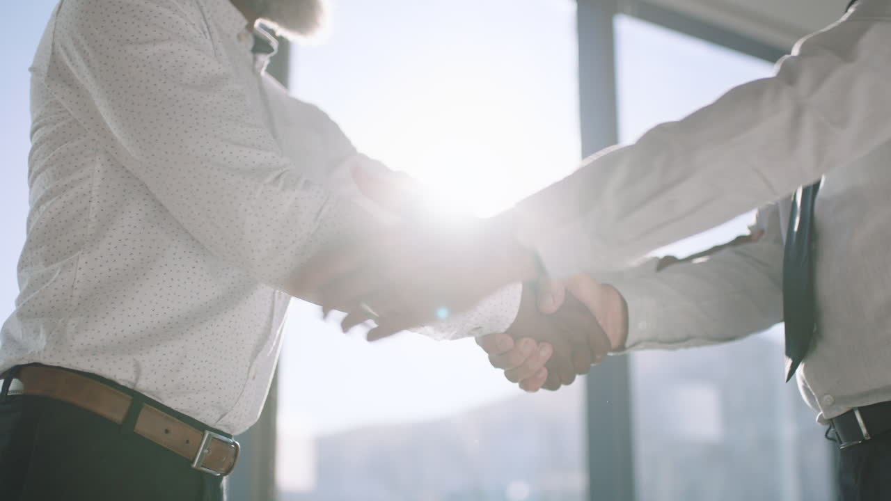 close up handshake business people shaking hands successful corporate partnership deal welcoming opportunity for cooperation in office 4k footage