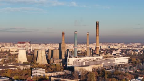 Rotating-Aerial-View-of-a-Dormant-Coal-Fired-Power-Plant-in-Eastern-Europe,-Romania