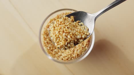 slow motion close up of small korean sesame seeds