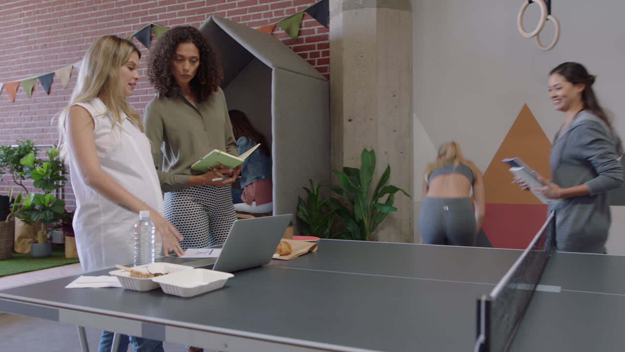 professional business women team brainstorming pregnant boss woman sharing creative ideas enjoying collaborating with colleagues in modern office