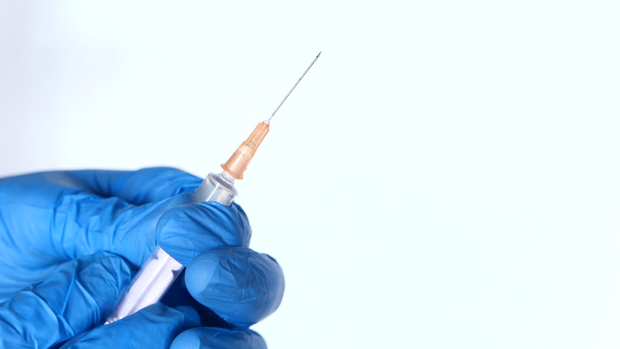 jeringuilla en guante