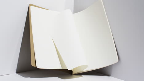 video of book with white blank pages and copy space on white background