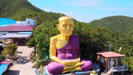 aerial 4k drone footage of the kuan yin statue on the island of koh lan