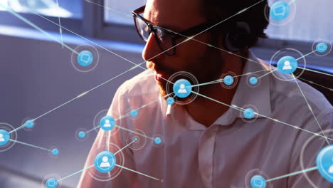 network connections and communication animation over man wearing headset in office