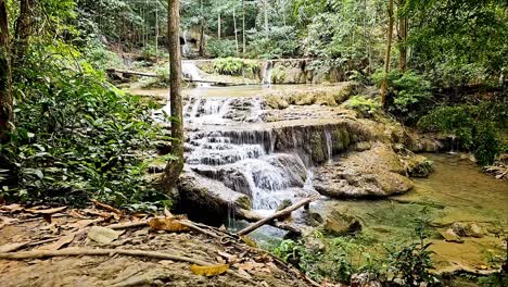 Clean-fresh-waters-cascading-down-Erawan-Waterfalls-flowing-down-a-network-of-streams-in-a-National-Park-located-in-the-province-of-Kanchanaburi-in-Thailand